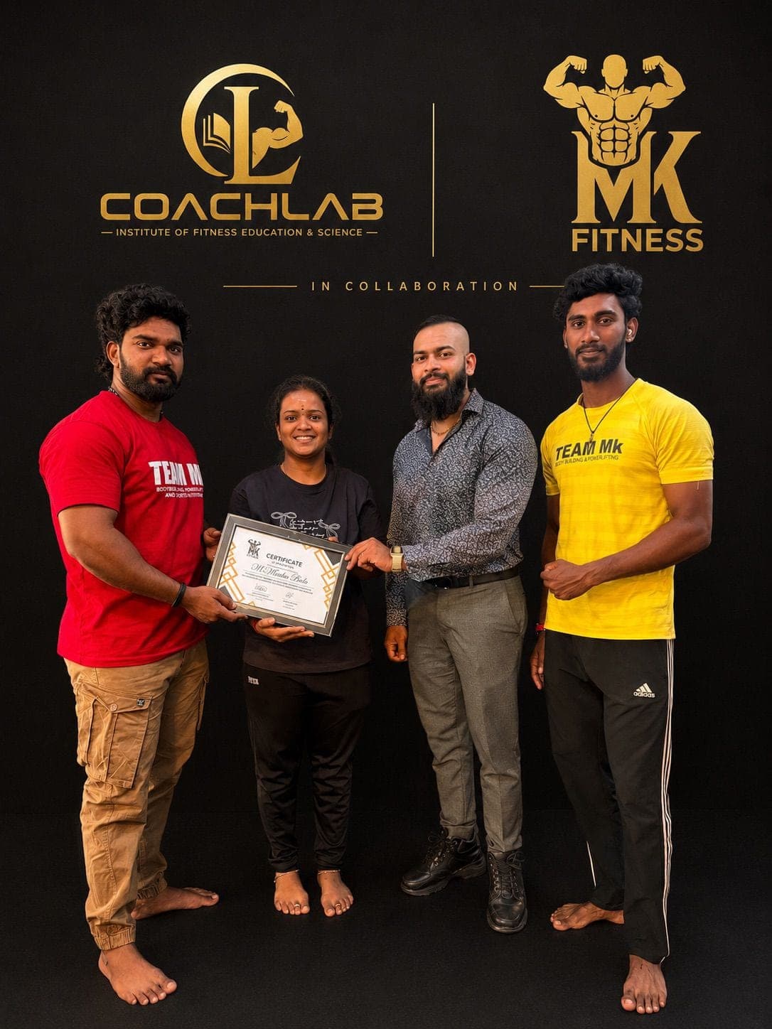 A CoachLab graduate holding a framed certificate at a certification day.